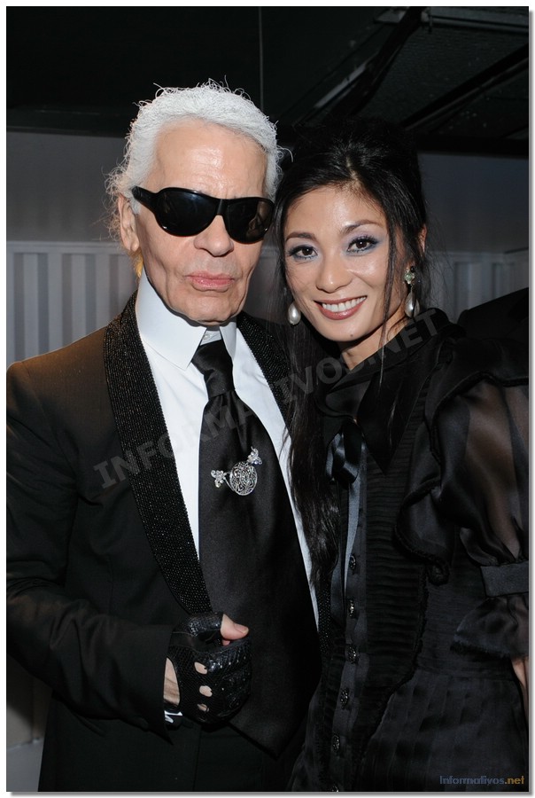 Karl Lagerfeld y Sue Jin Kang (Prima Ballerina, Stuttgart Ballet, Germany) en la CHANEL Mobile Art Gala Party, the Star Ferry Car Park  (Hong Kong)