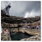 :: Pulse para Ampliar :: Steven LoBue of the USA dives from the 28 metre platform during the fourth stop of the Red Bull Cliff Diving World Series, Inis Mor, Aran Islands, Ireland on August 4th 2012. 
