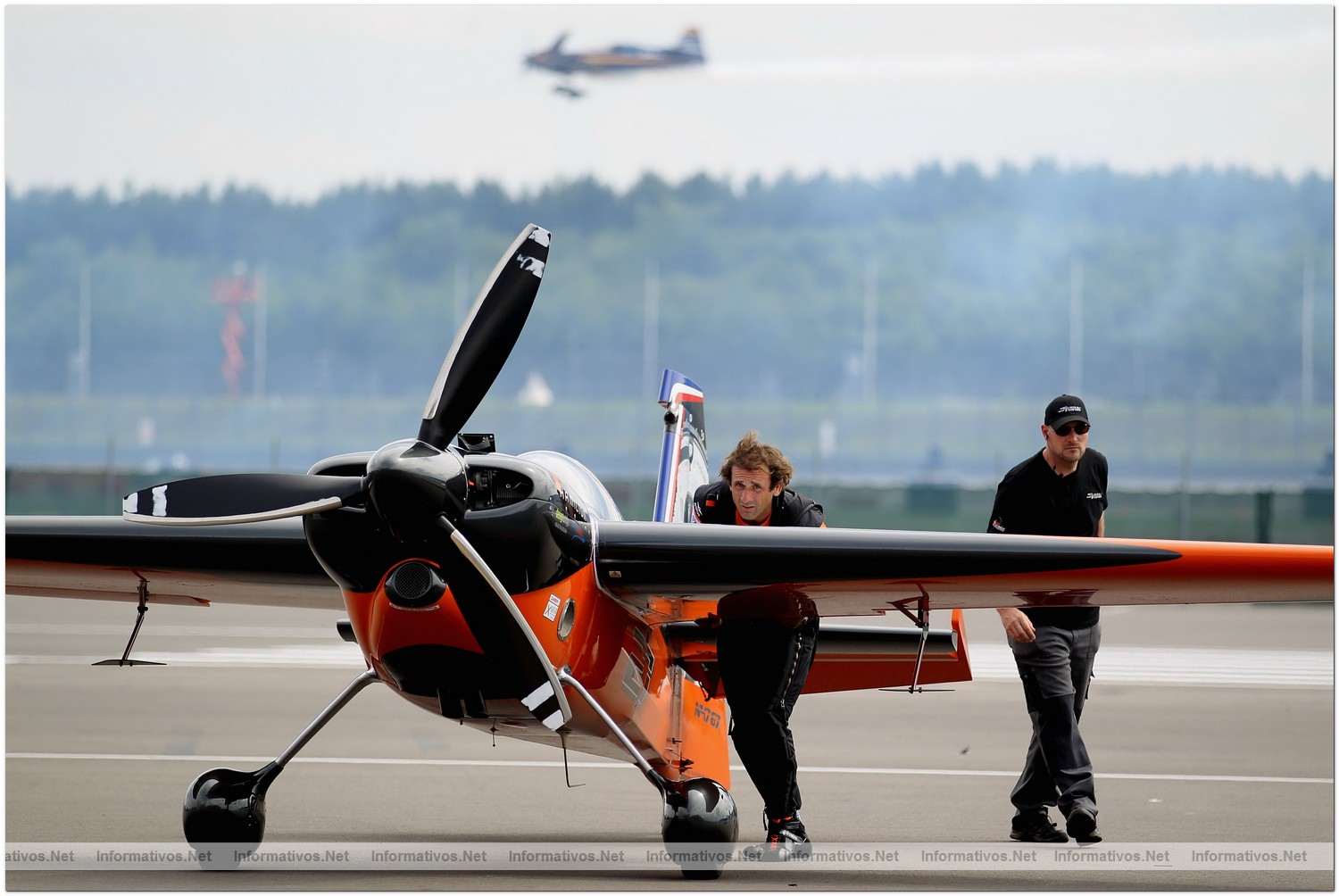 Nicolas Ivanoff of France pushes his plane during Round 6, training day 1 of the Red Bull Air Race World Championship at the Eurospeedway, Lausitz on August 5, 2010 in Germany.