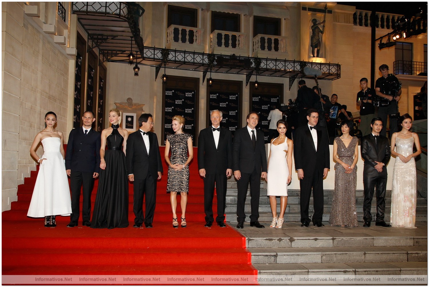 BEIJING, CHINA - JUNE 01:  (L-R) Actors Yao Chen, Clemens Schick, Amber Heard, Managing Director Montblanc China Thomas Kuh, actress Naomi Watts, CEO Montblanc International Lutz Bethge, actors Nicolas Cage, Jessica Alba, President and CEO of Montblanc Asia Pacific Jim Siano, actors Maggie Cheung, Vic Chow and Lynn Xiong attend the Montblanc international gala to celebrate the official opening of its new and biggest concept store in the world at the Montblanc Sanlitun Concept Store on June 1, 2012 in Beijing, China.
